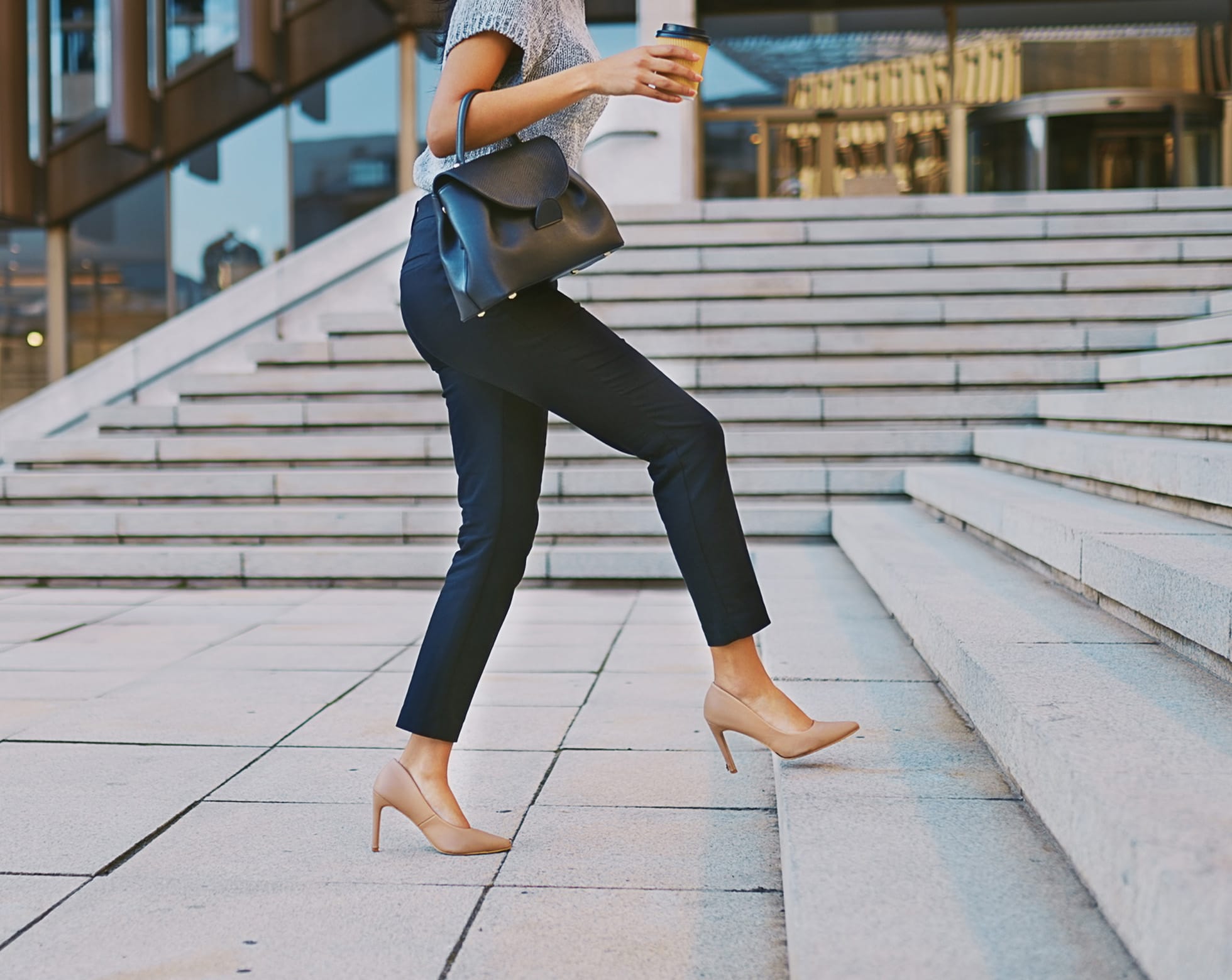Woman walking up the stairs