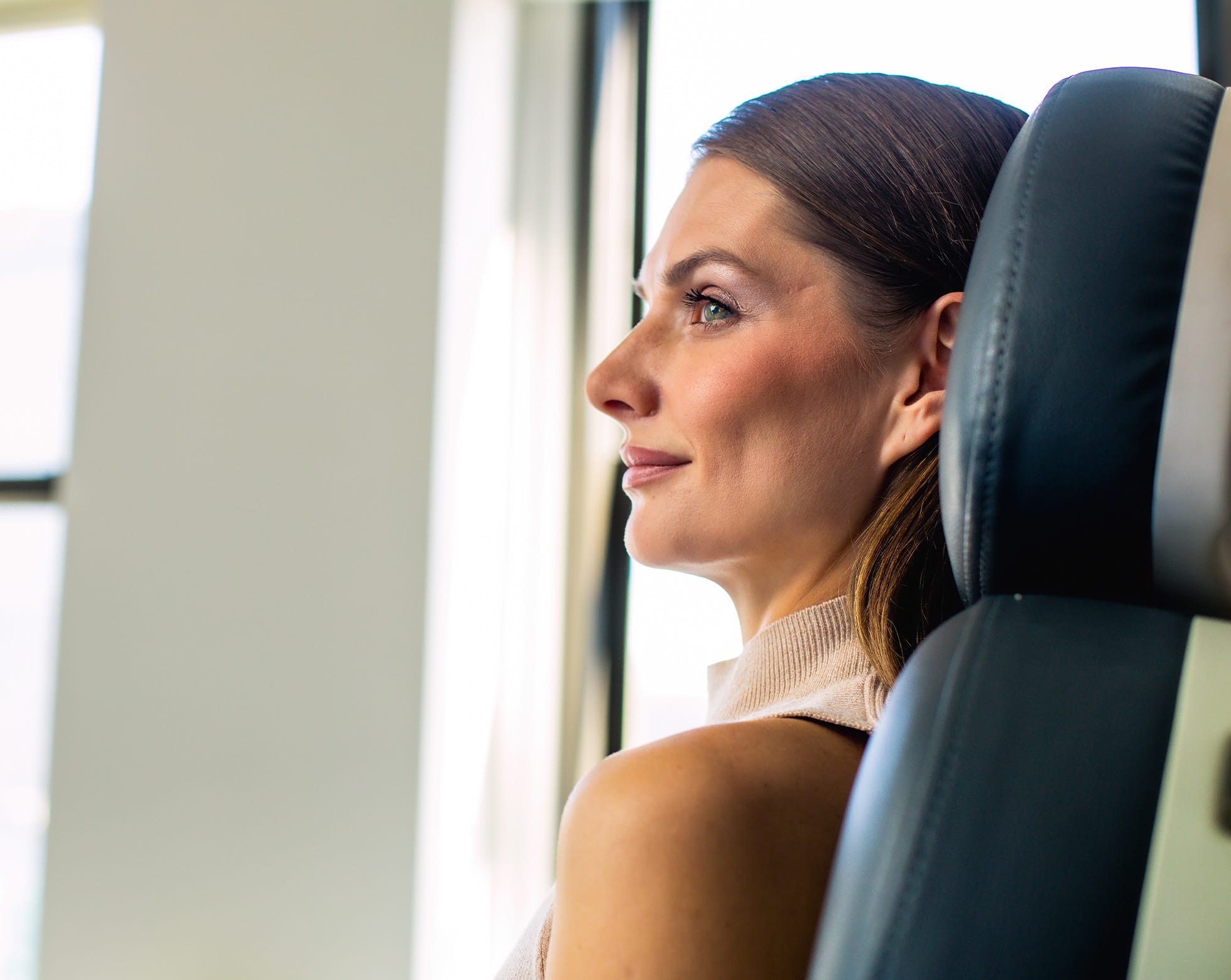 Woman smiling in a chair