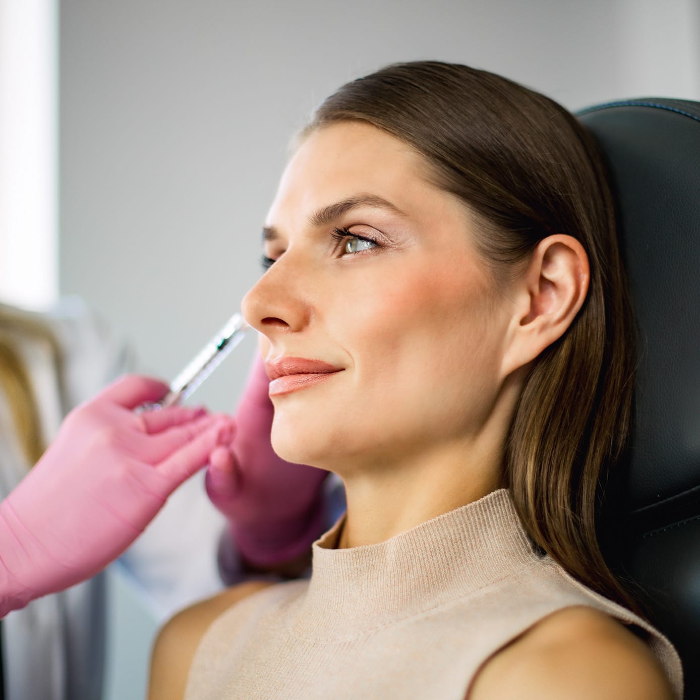 Woman getting injection treatment