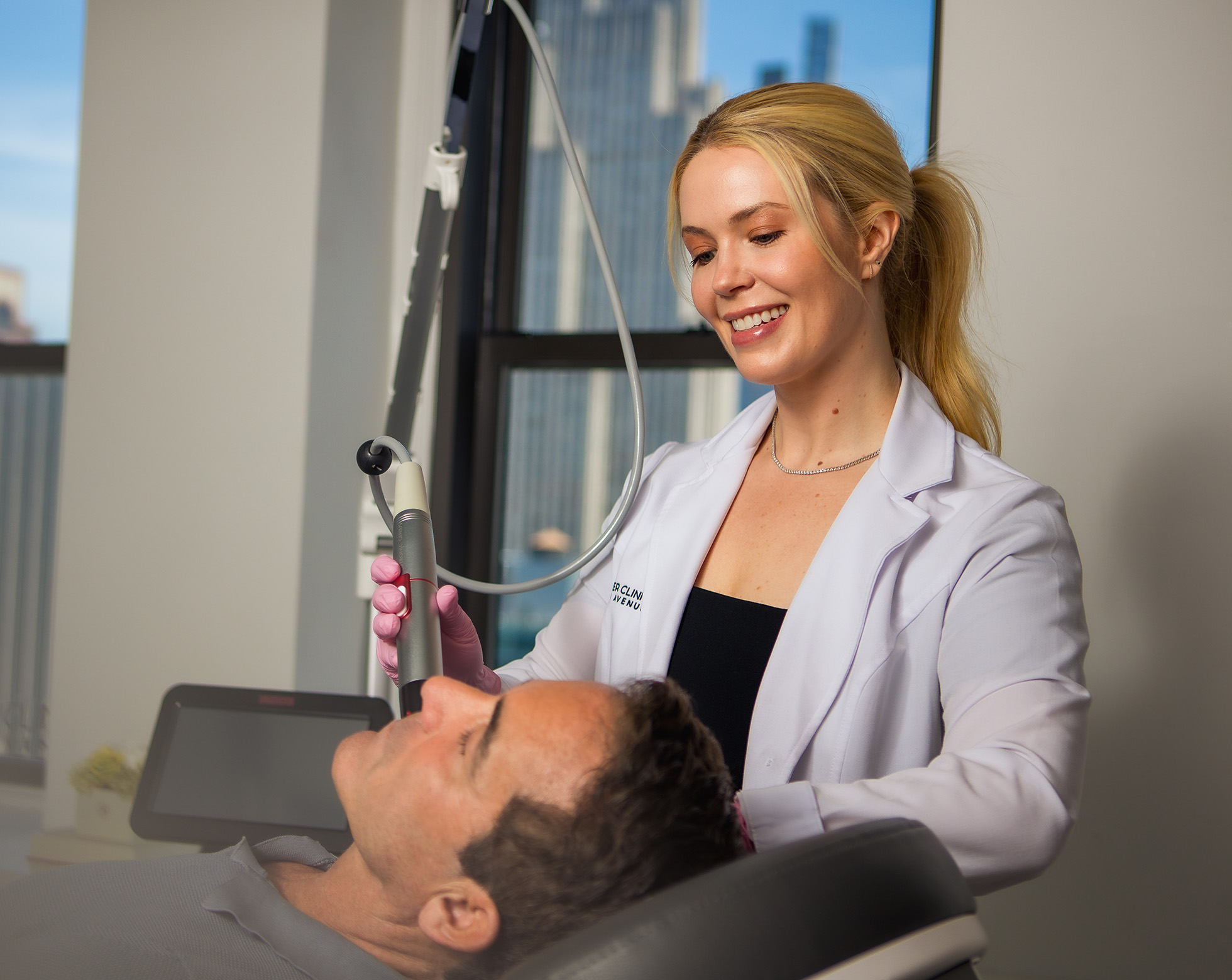 male patient getting a non-surgical face treatment