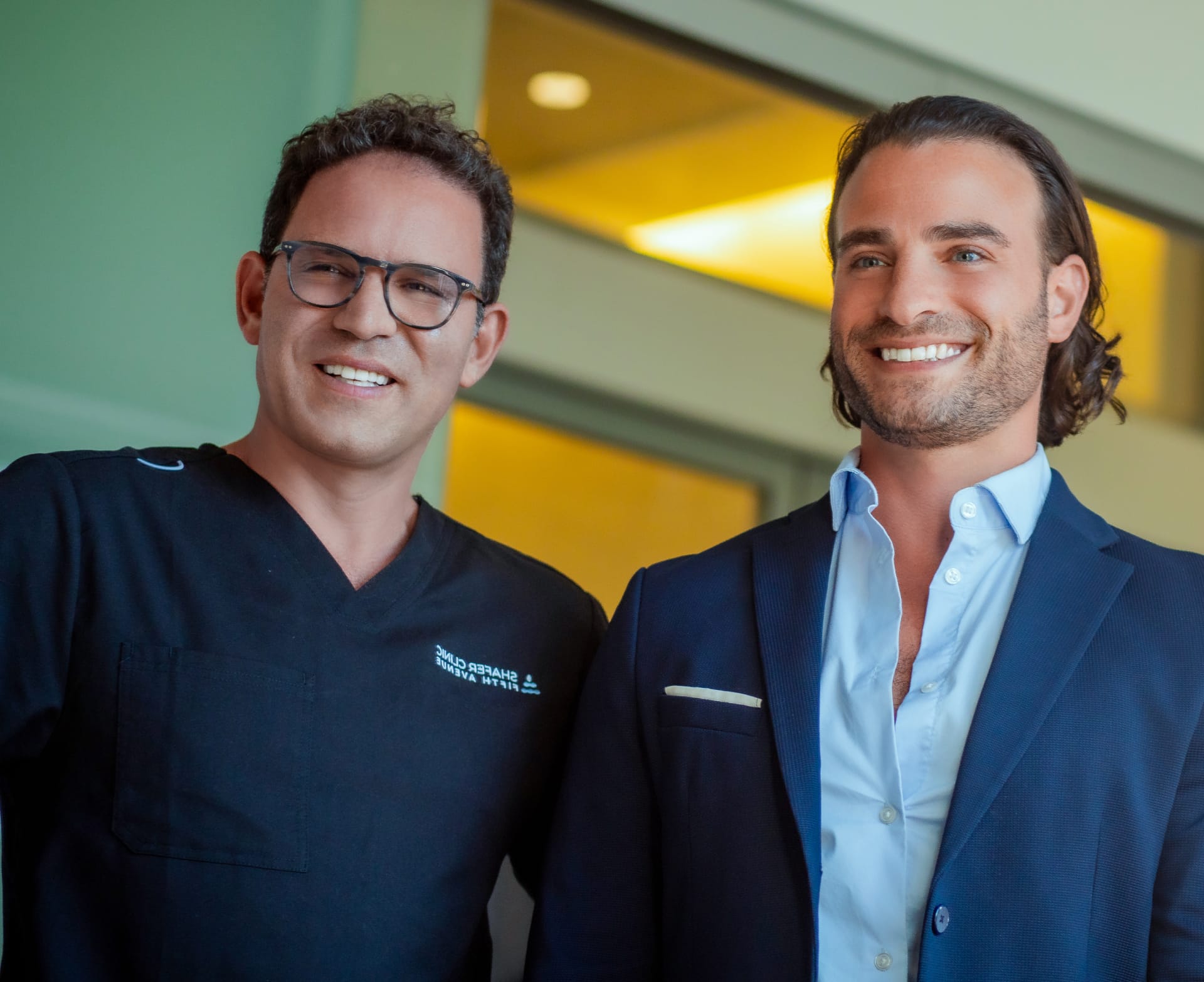 Dr. Shafer with a man in a blue jacket